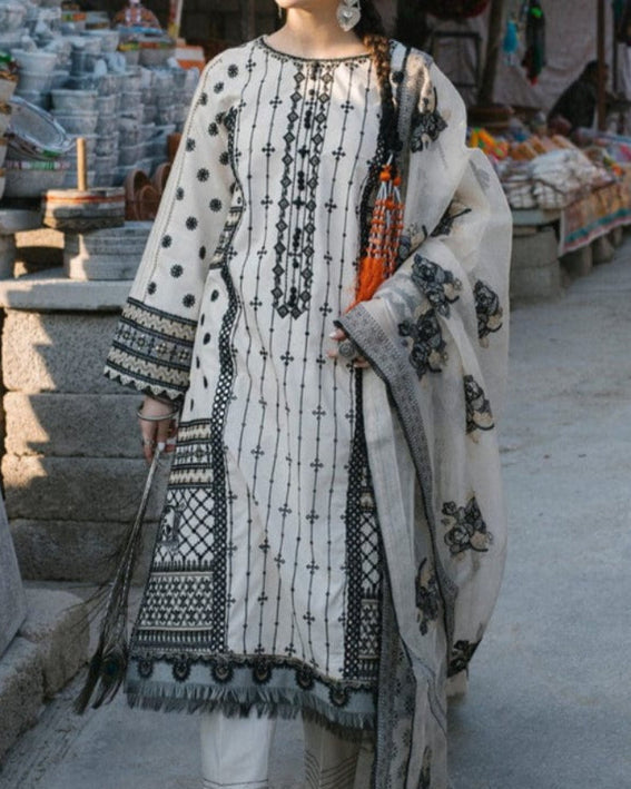 SMT S693-Embroidered 3pc lawn dress with Embroidered Organza dupatta.